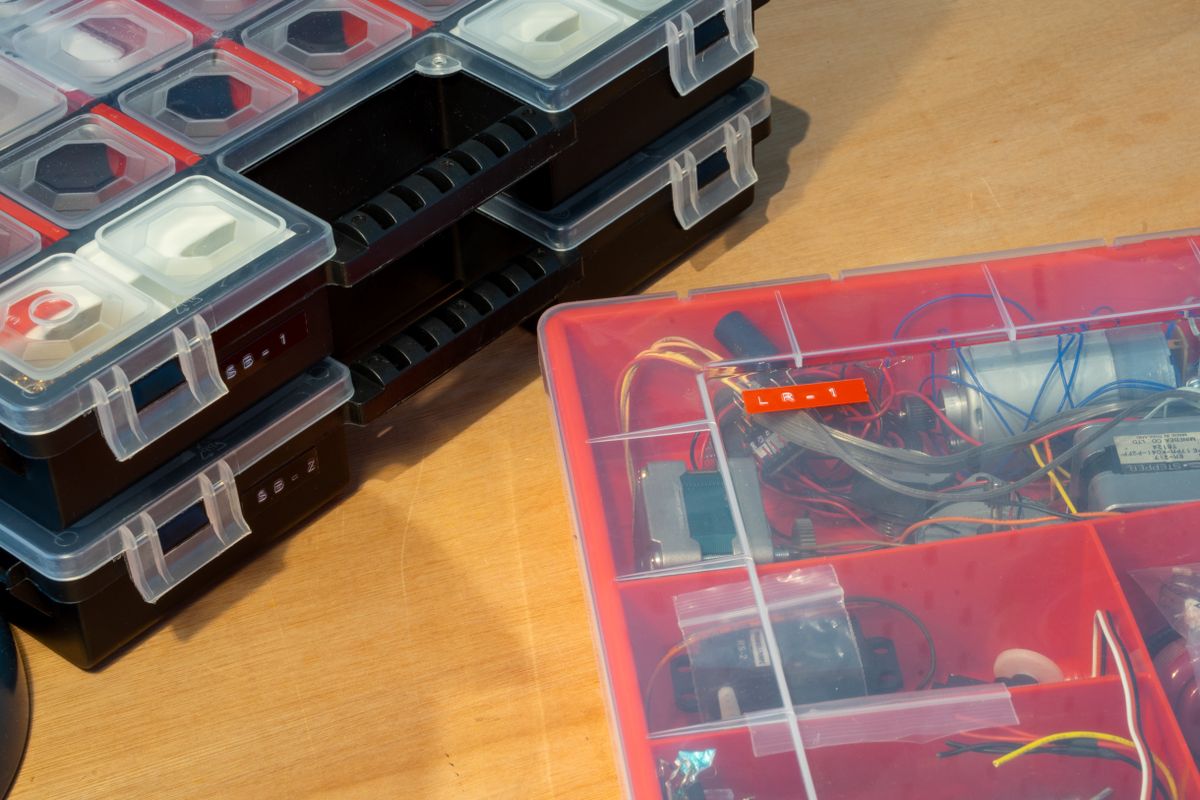 Closeup of three assortment boxes with their Dymo labels